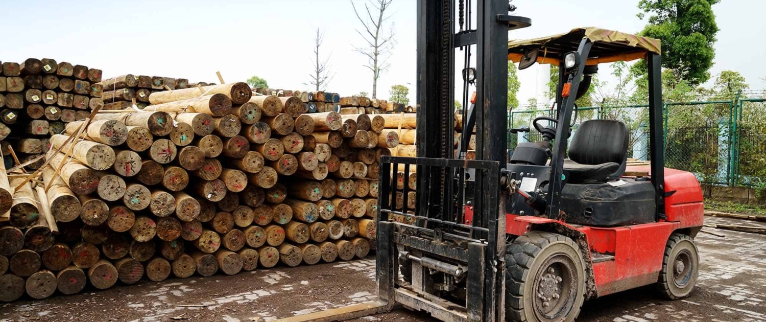 A Forklift Is Parked In A Timber Factory