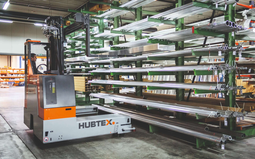 Side view of a hubtex forklift in warehouse